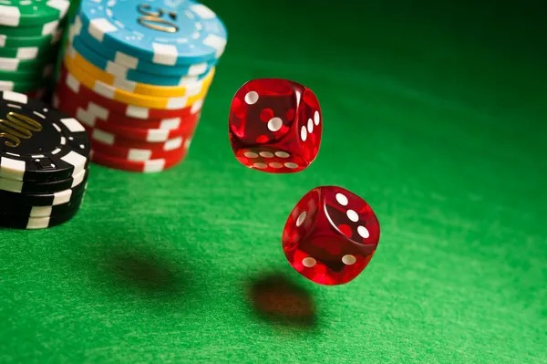 Live dealer at blackjack table in professional studio